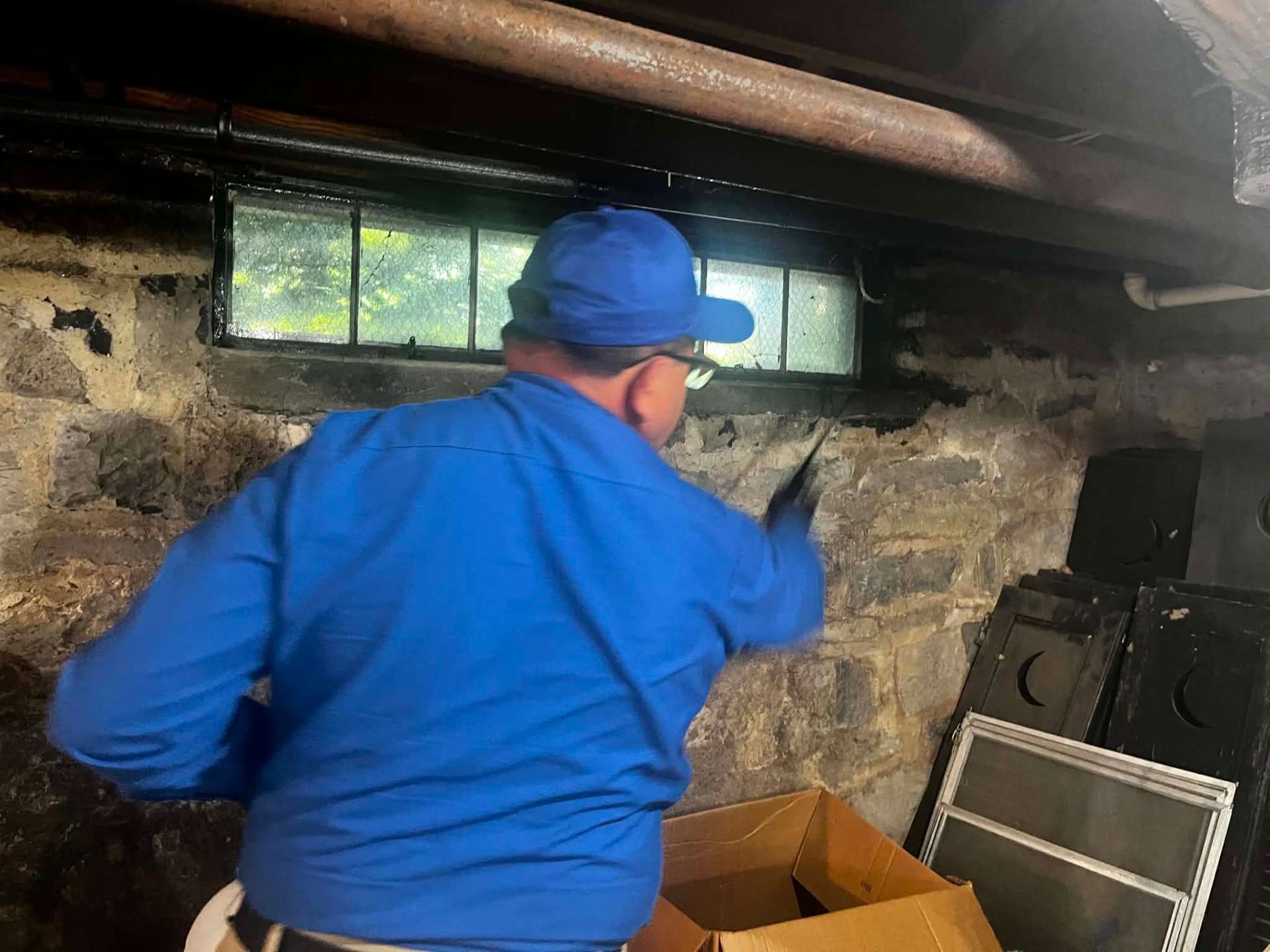 Preferred Pest Pros owner performing basement and crawlspace pest inspection